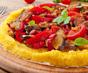 Polenta with vegetables - corn grits pizza with tomato and eggpl